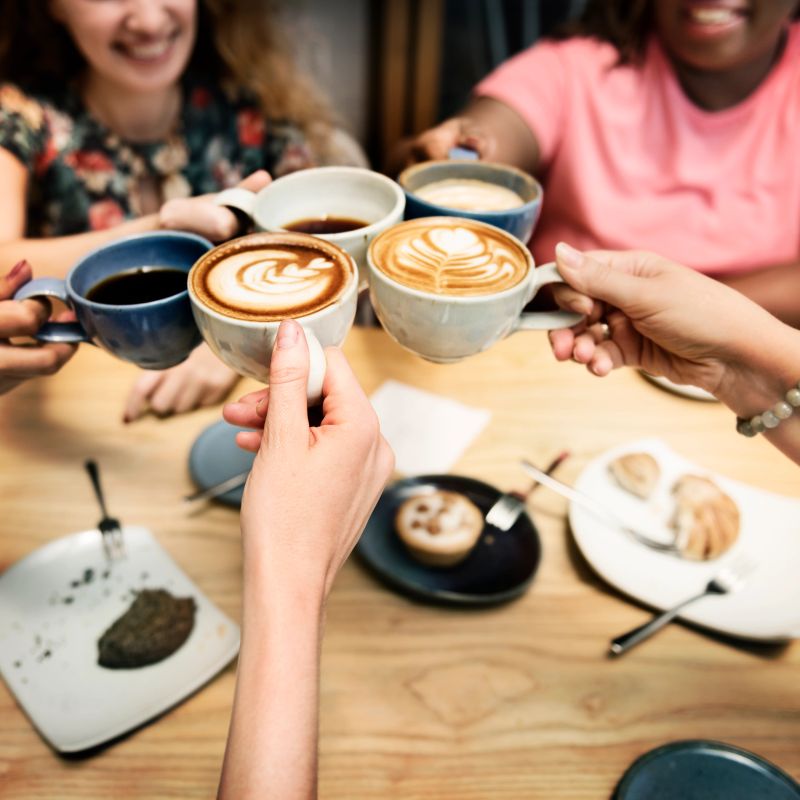 Warm cup of coffee beans and freshly roasted blend